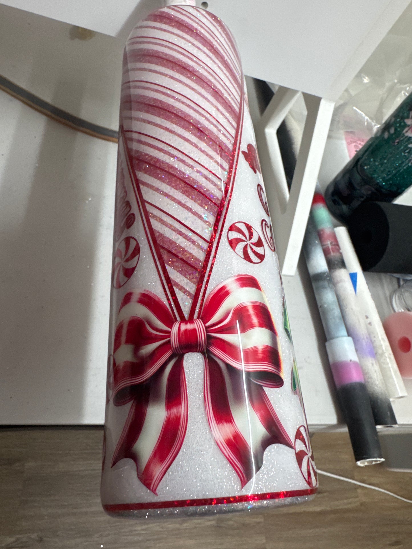 32 oz tipsy candy cane peekaboo with UVDTFs and decals