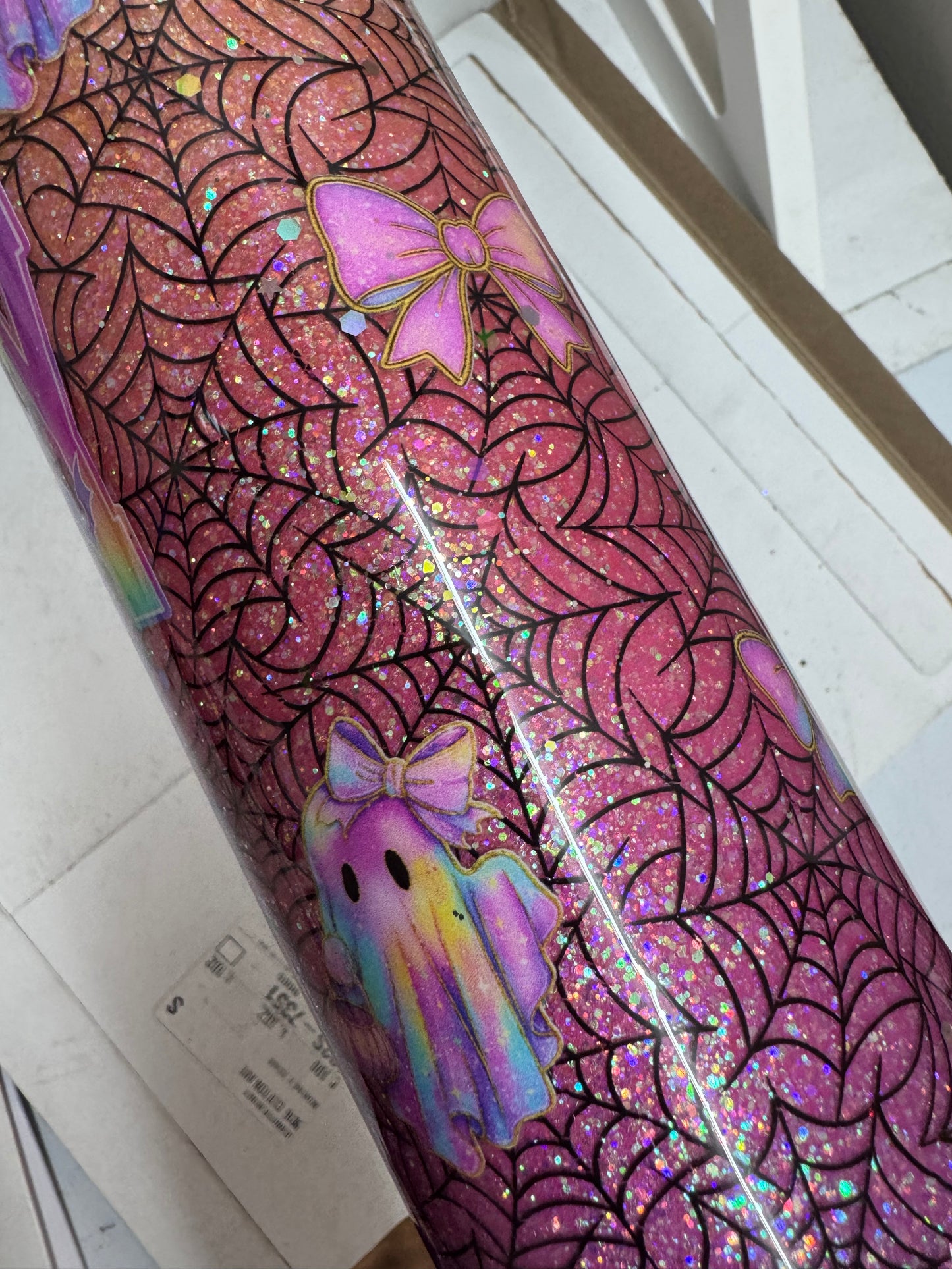 32 oz tipsy Halloween glitter, vinyl, and UVDTFS (may need one more coat of epoxy)