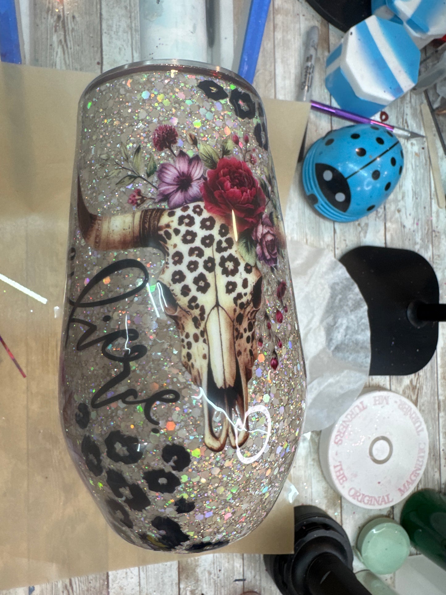 17 oz wine Floral Bull skull on glitter with leopard spots **needs additional coats of epoxy before shipping