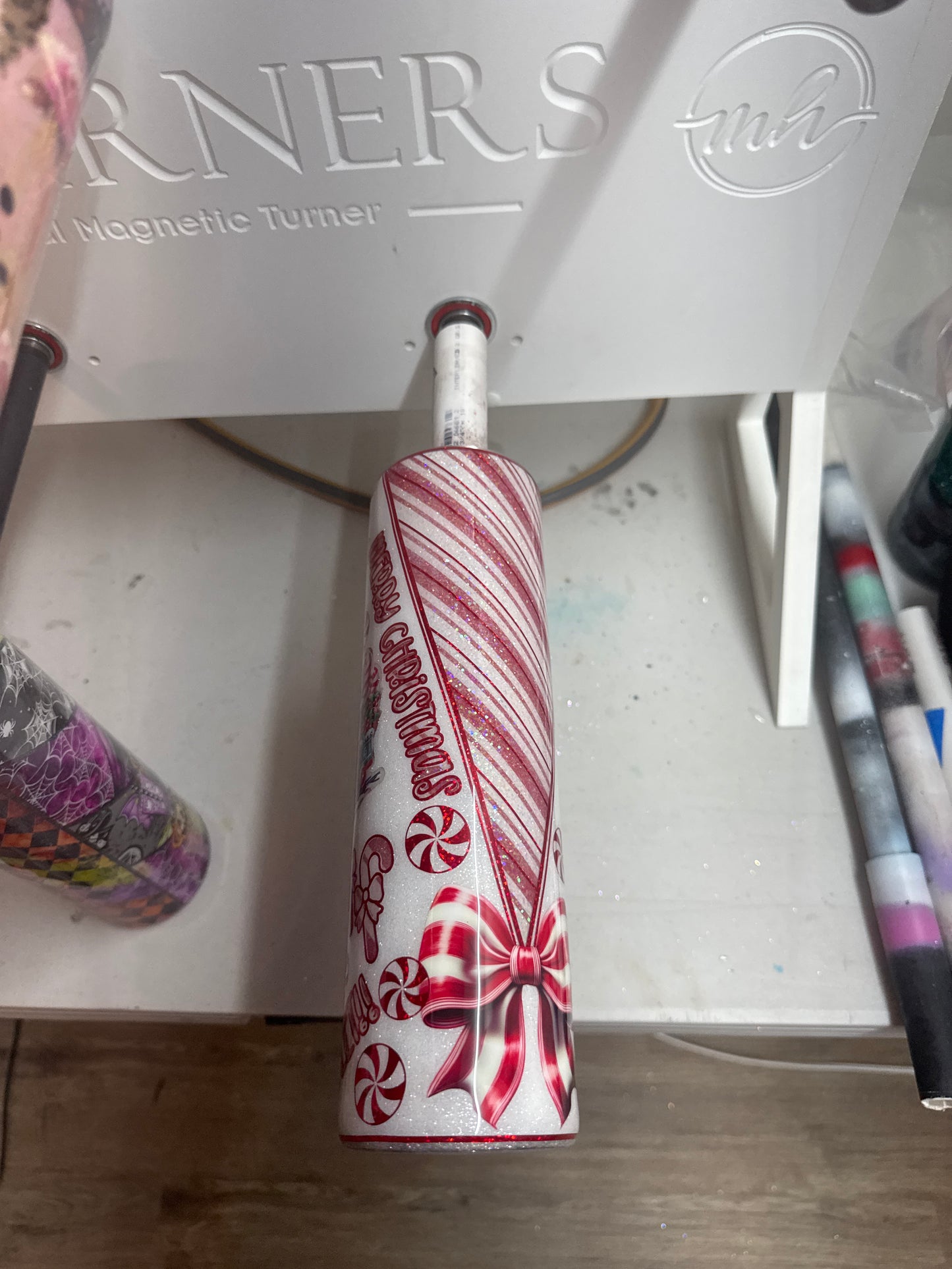 32 oz tipsy candy cane peekaboo with UVDTFs and decals